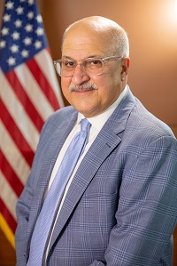 Official portrait of John J. Lombardi